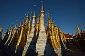 Inle Lake Myanmar. Indein, on the summit of a hill the  Shwe Inn Thein Paya a cluster of hundreds of ancient stupas. Many of them are ruined and overgrown with bushes. 